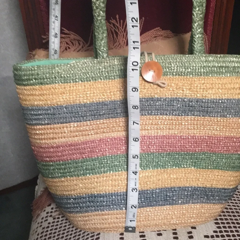 Natural straw bag in green blue, red colors